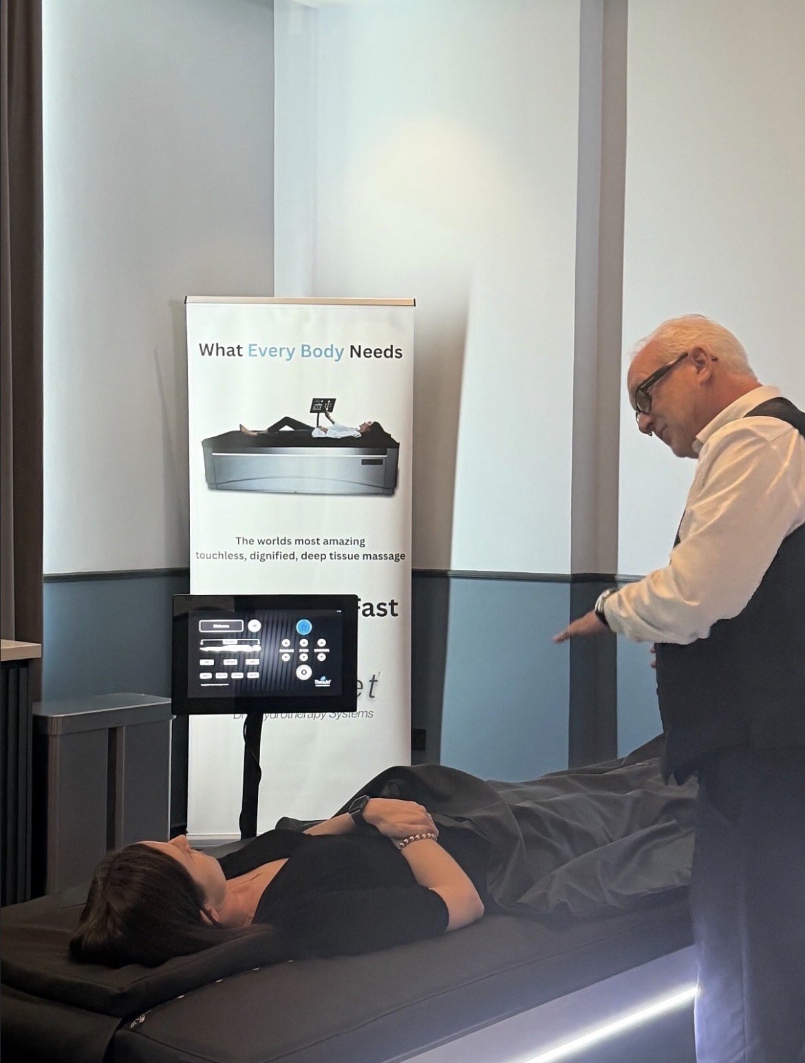 A TheraJet dry-hydrotherapy system in use at a demonstration